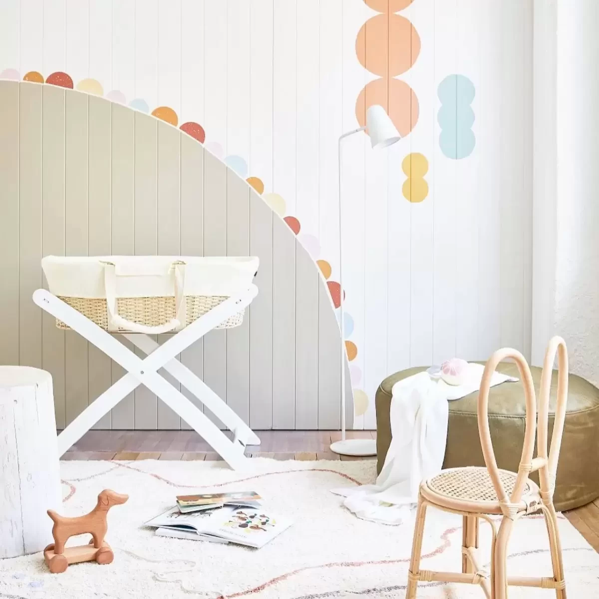 a nursery designed in white decor
