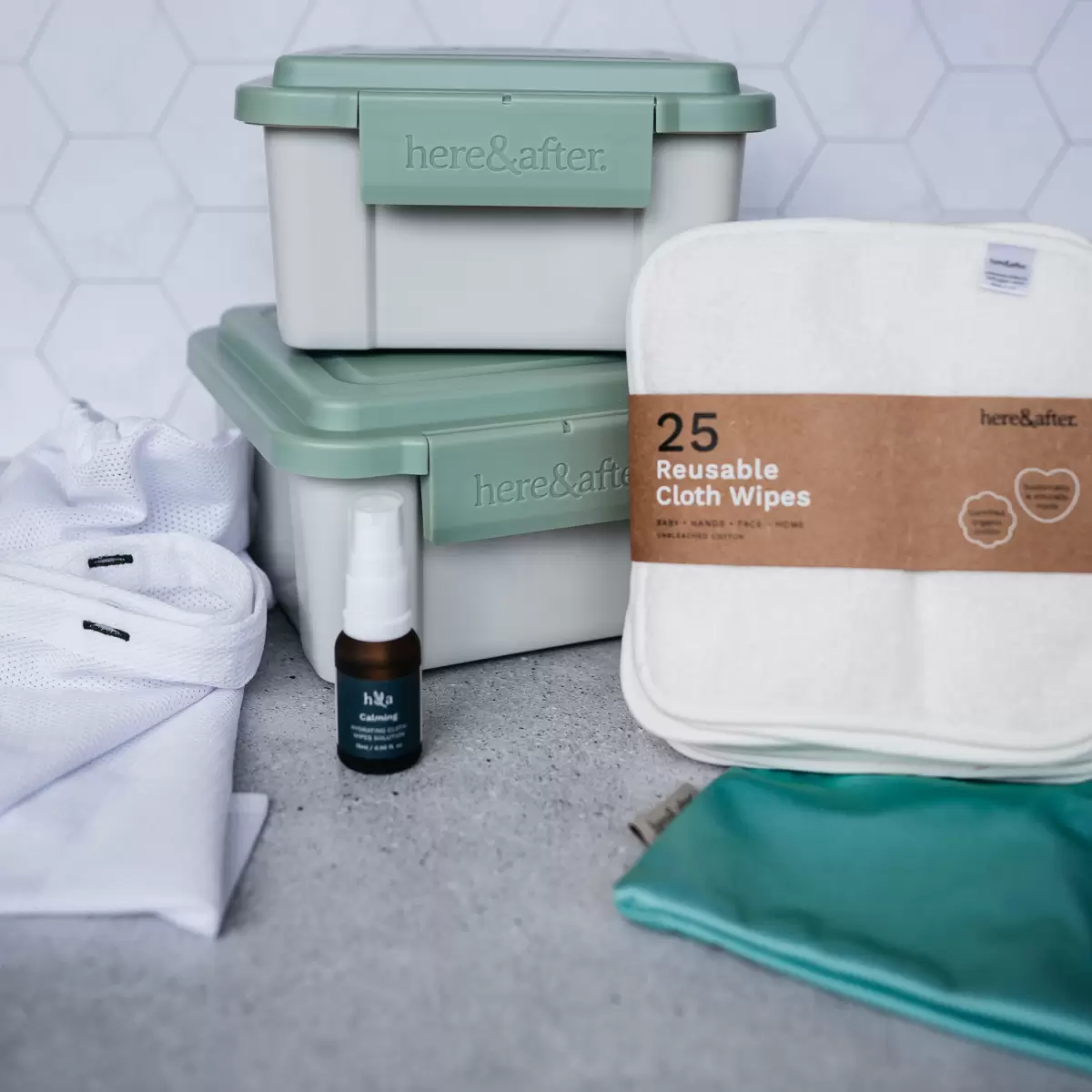 Award-winning Australian reusable wipes set by Here & After with 25 organic cotton wipes, two containers, wash bags, and hydrating solution.