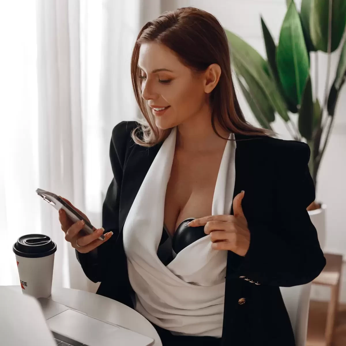 A mum wearing a breast pump
