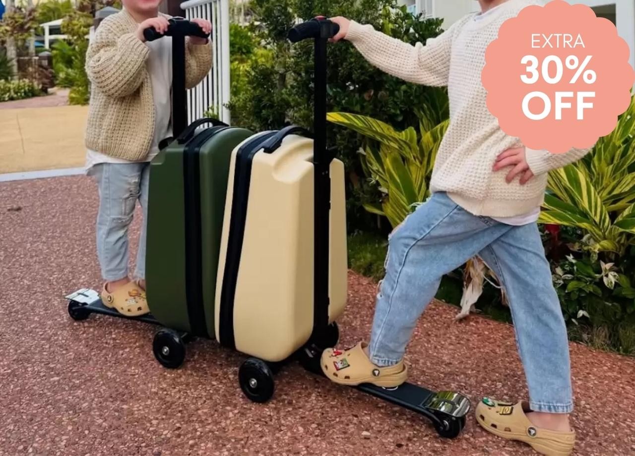 two kids with scooter suitcases
