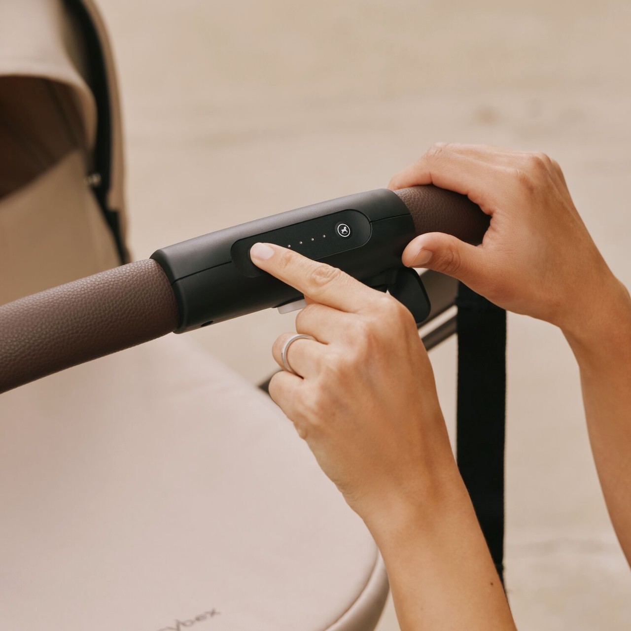 A photo showing the Cybex e-gazelle s double pram's electric capabilities