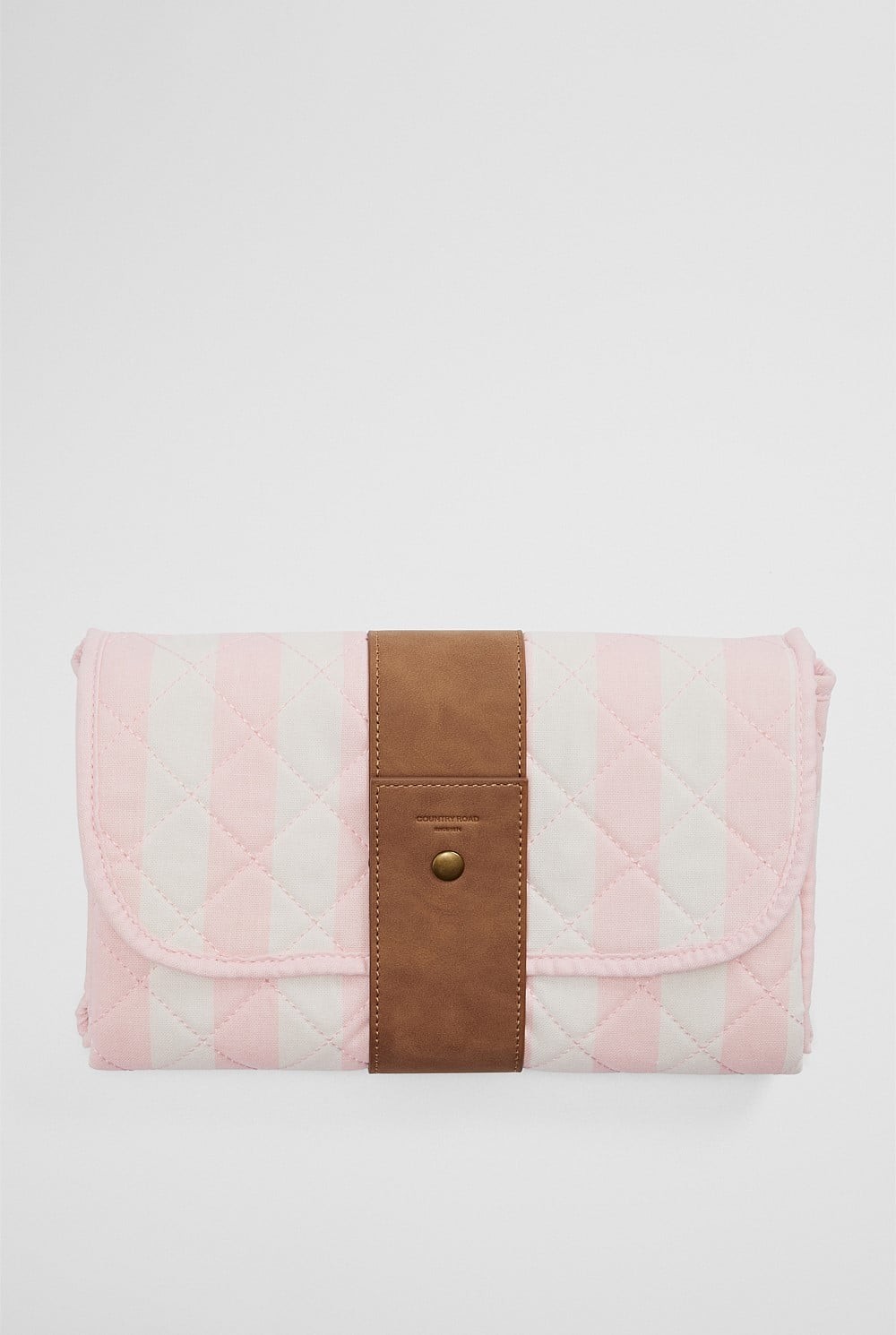 Country Road travel change mat shown in pink stripe