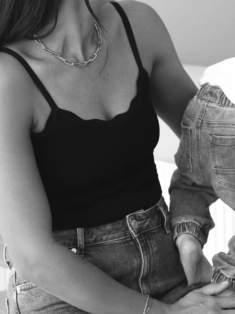 A mum wearing the mumma milla cami in black