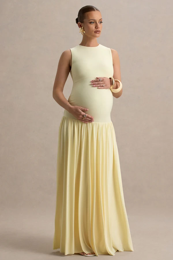 A yellow baby shower dress by Club L