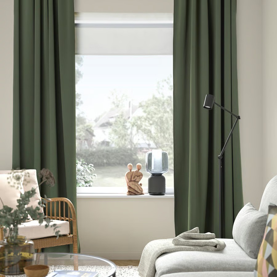 The Ikea blockout curtains shown in a lounge room