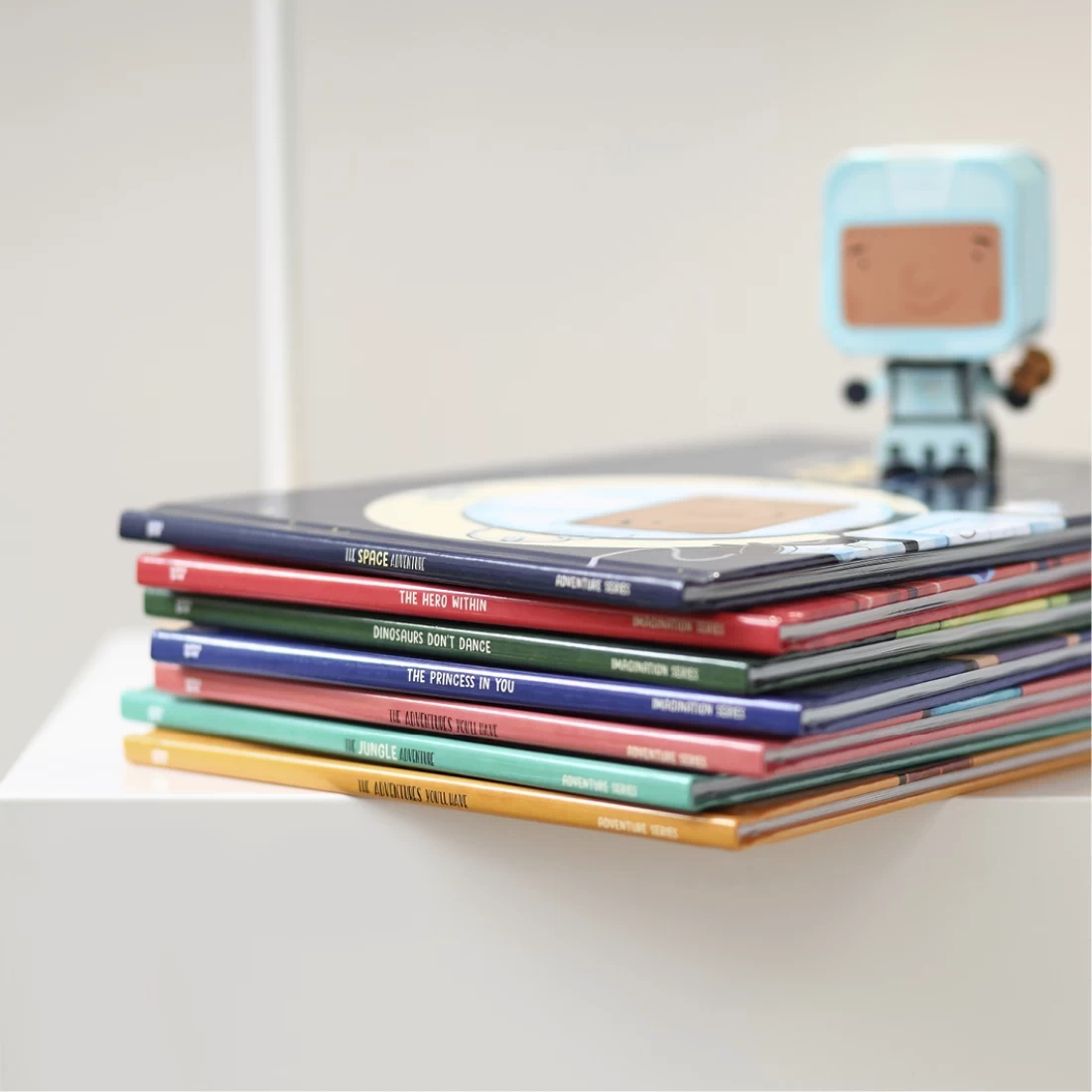 Stack of Hippo Blue personalised storybooks, thoughtful and fun options for the Best Christmas Presents for Kids.