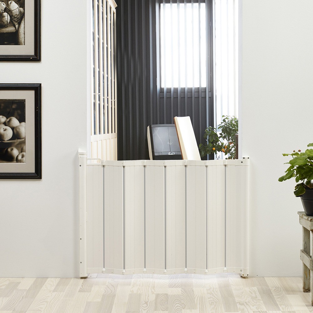 A white modern baby gate by babydan