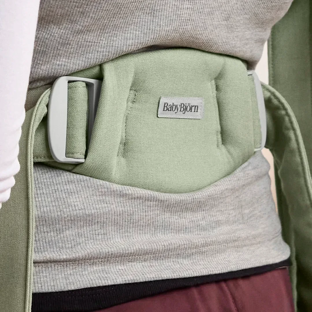 a close up of the baby carrier hold