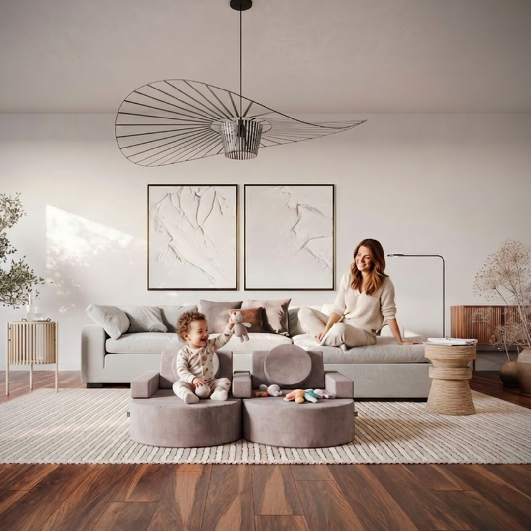 A mum and her baby who is playing on one of the Loungey play couches