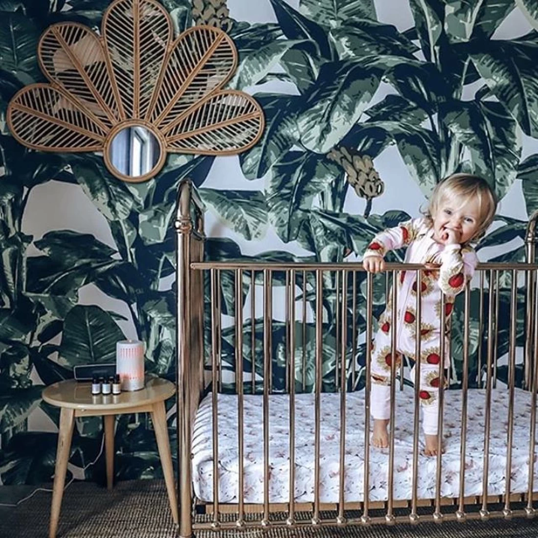 Cosy bohemian nursery décor styled with macramé and soft pastels, included in the Best Baby Girl Nursery Ideas.
