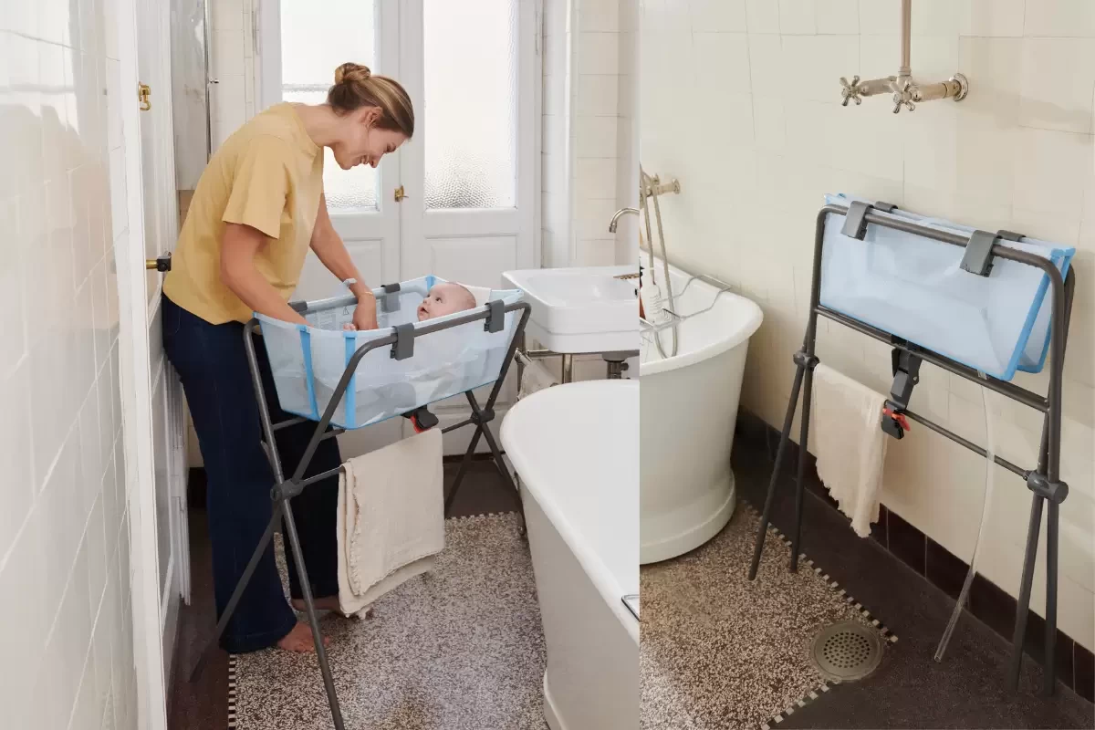 A mum with her baby in a baby bath