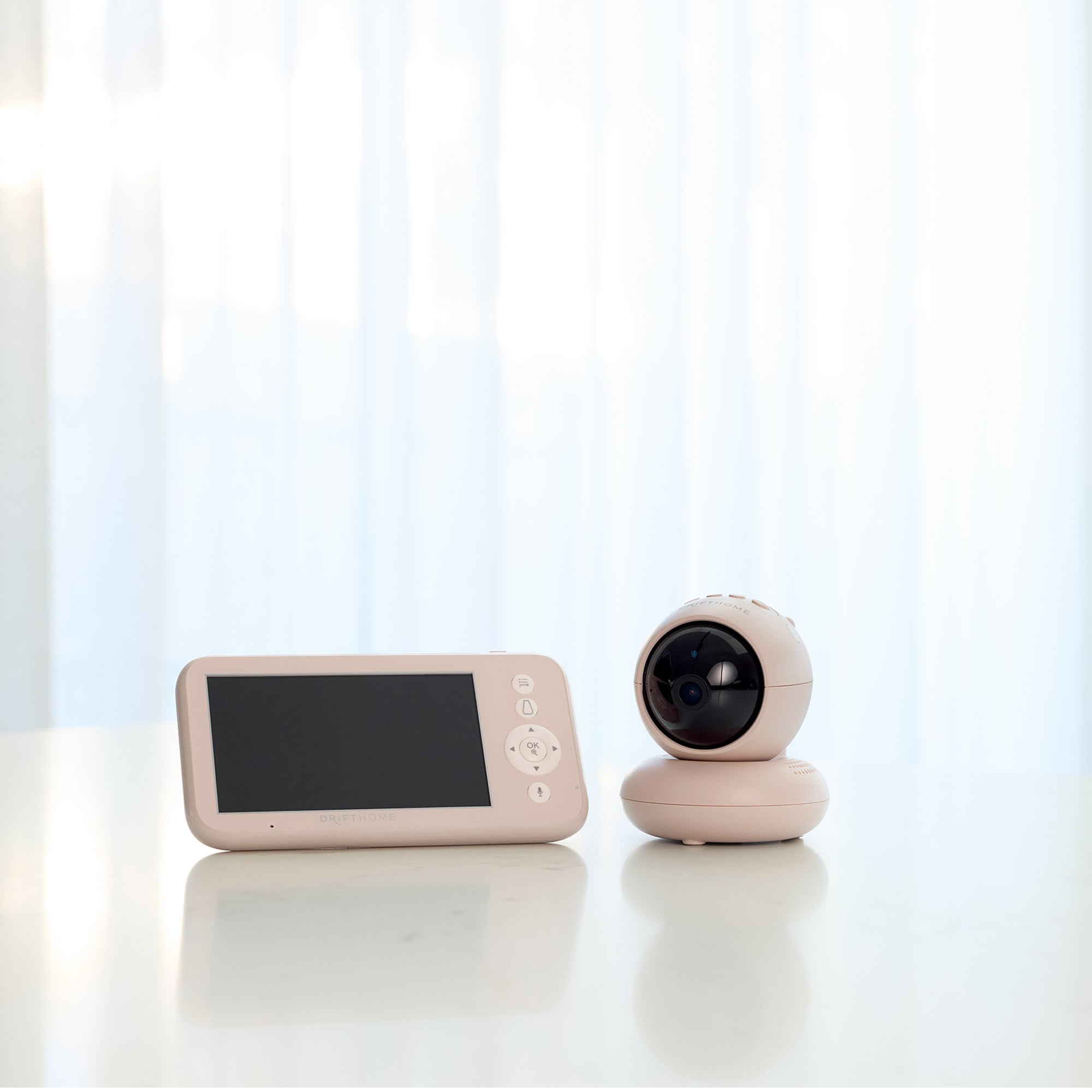 Ergopoiuch Baby monitor camera placed on a nursery table for easy sleep tracking