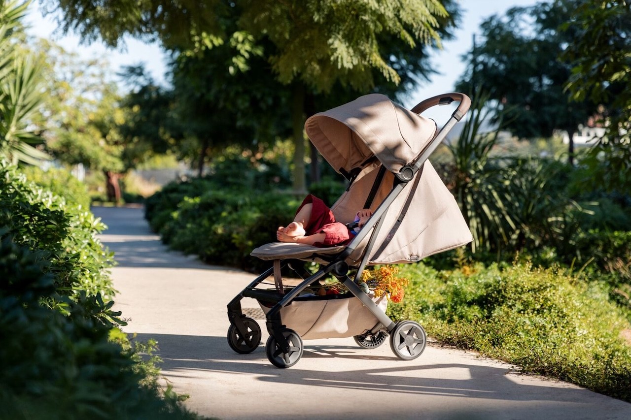The Joolz Aer2 pram with a baby lying flat in it asleep