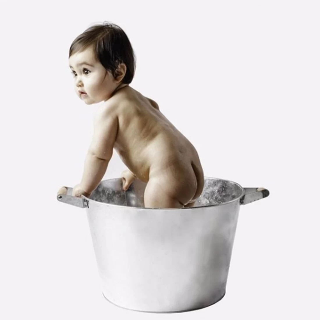 Illustrative banner featuring a baby on plain background for blog post on Unsafe Baby Products to Avoid.