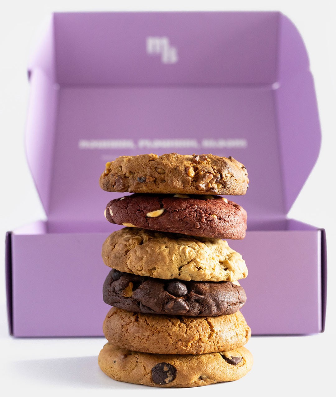 Stack of different Milk and Bloom  Chunky best lactation cookies—Australian-designed support for nursing mums.