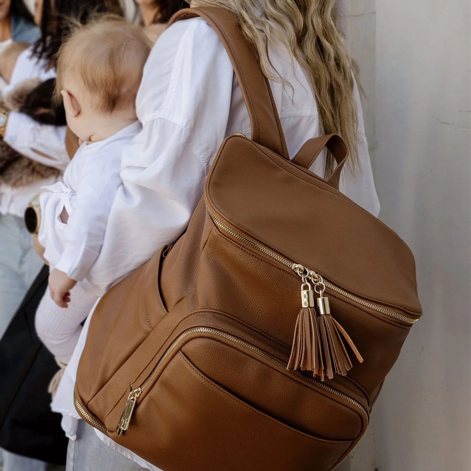Tottie baby bag worn on the back of an australian mum