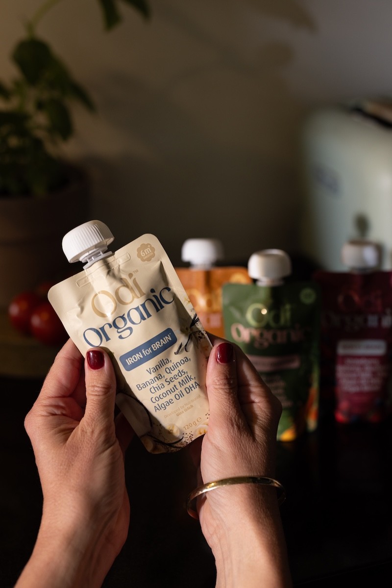 Three Odi Nutrition baby food pouches shown displaying their nutritional information