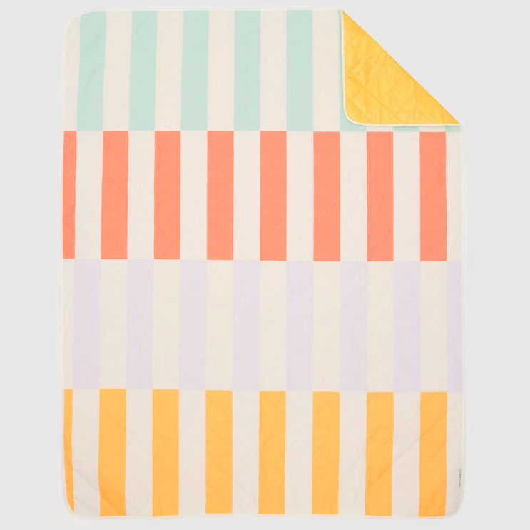Closer look at the best picnic rug featuring a modern striped design for outdoor use