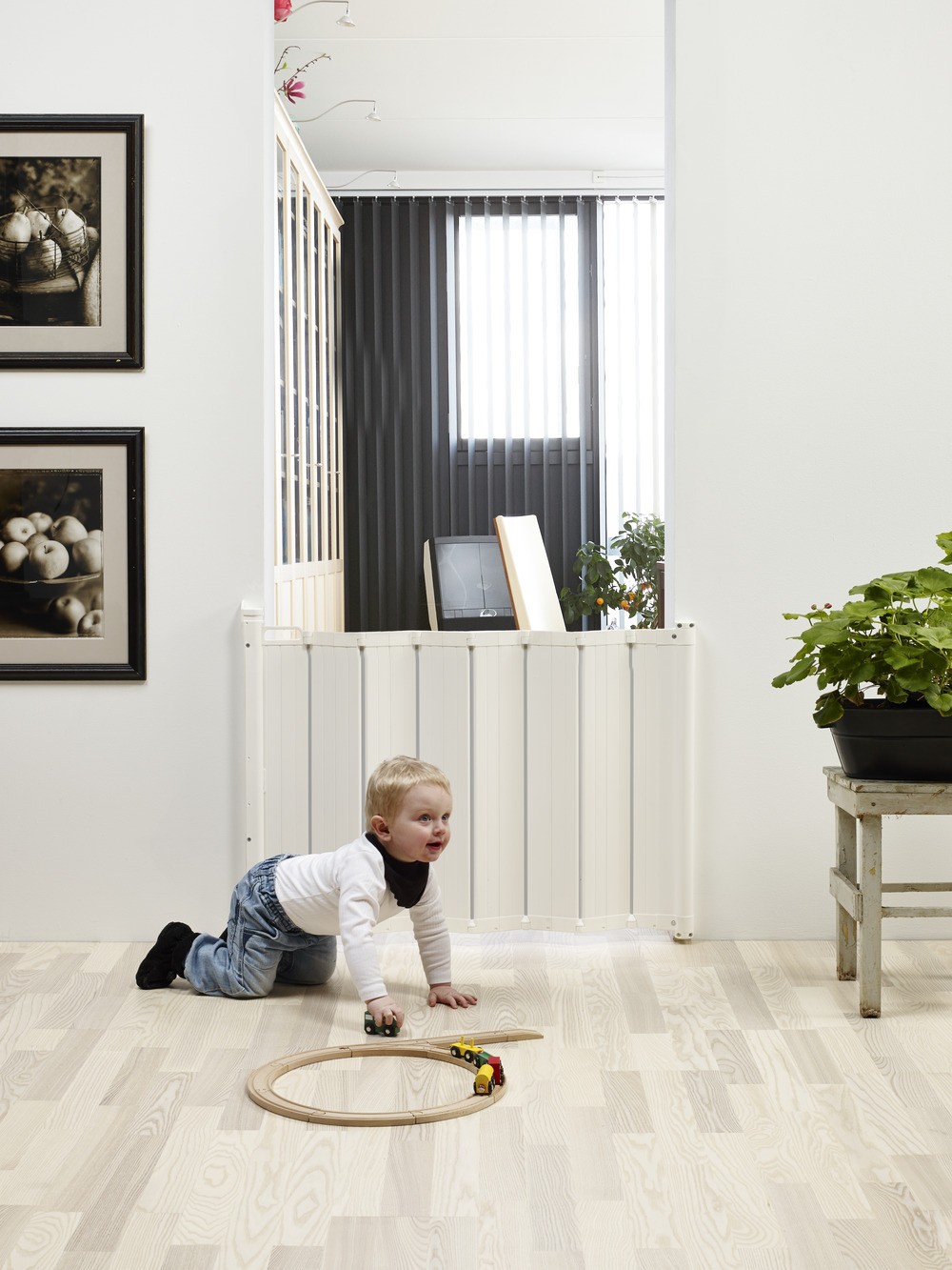 Baby crawling on the floor near Babydan Guard Me Gate White – one of the best safety gates for modern Australian homes