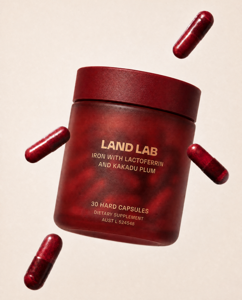 The Land Lab pregnancy iron supplement shown out of its container
