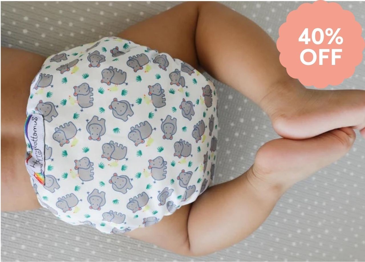 a baby wearing a hippybottomus reusable nappy