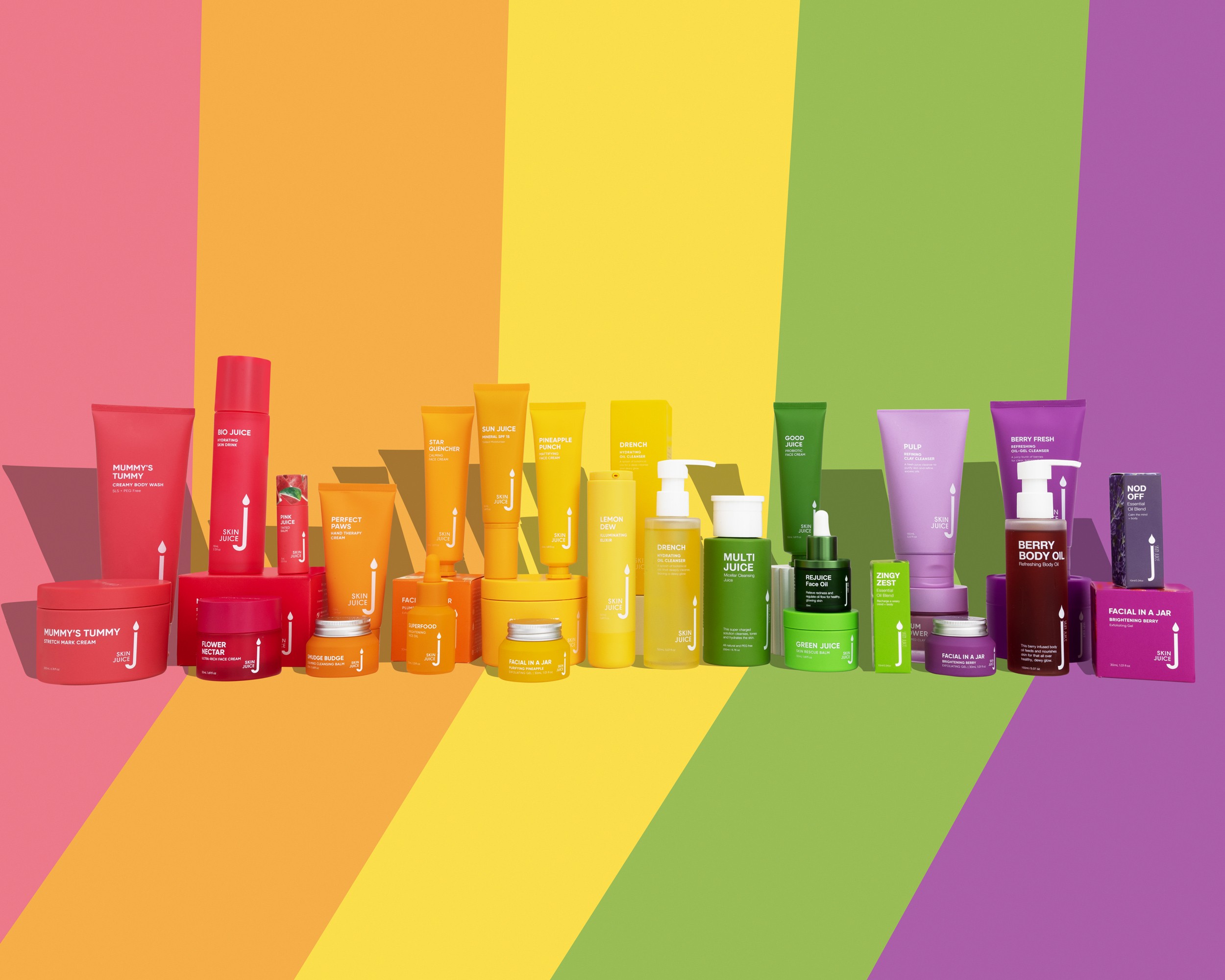 Skin Juice variety of colourful skincare bottles designed to support pregnancy skin condition care.