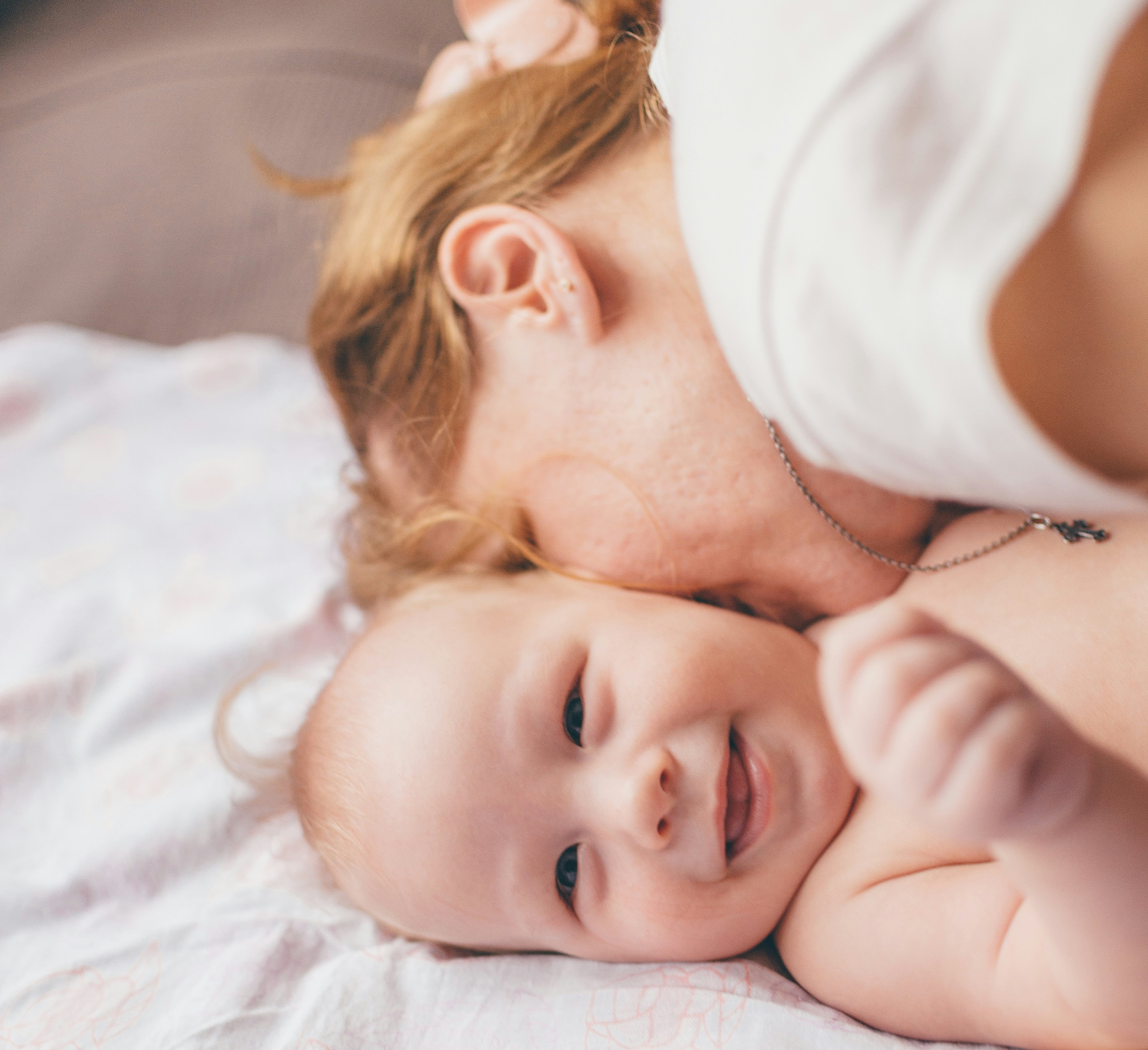 a mum and baby in a photo shoot