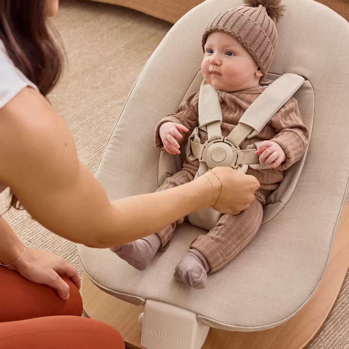a baby in a baby bouncer