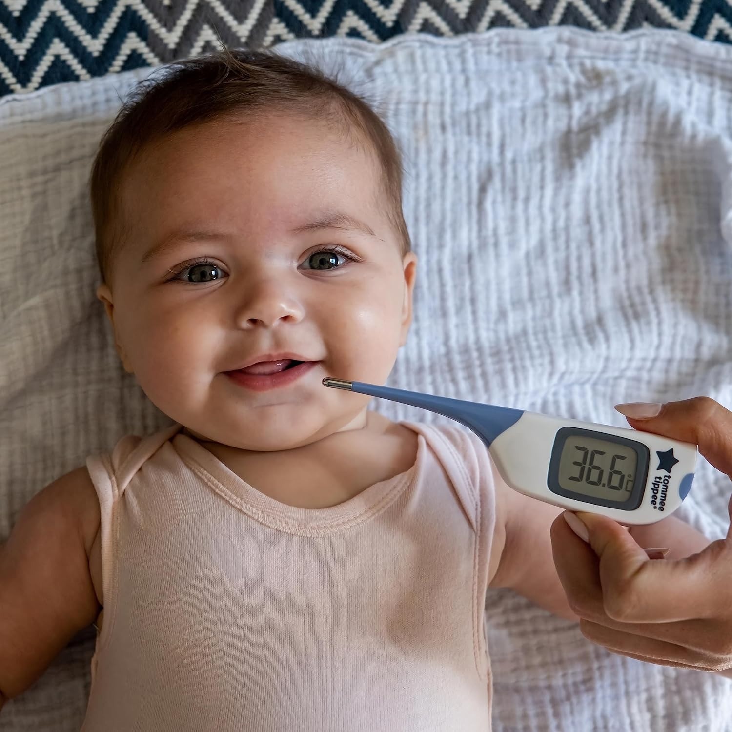 A baby using a baby thermometer