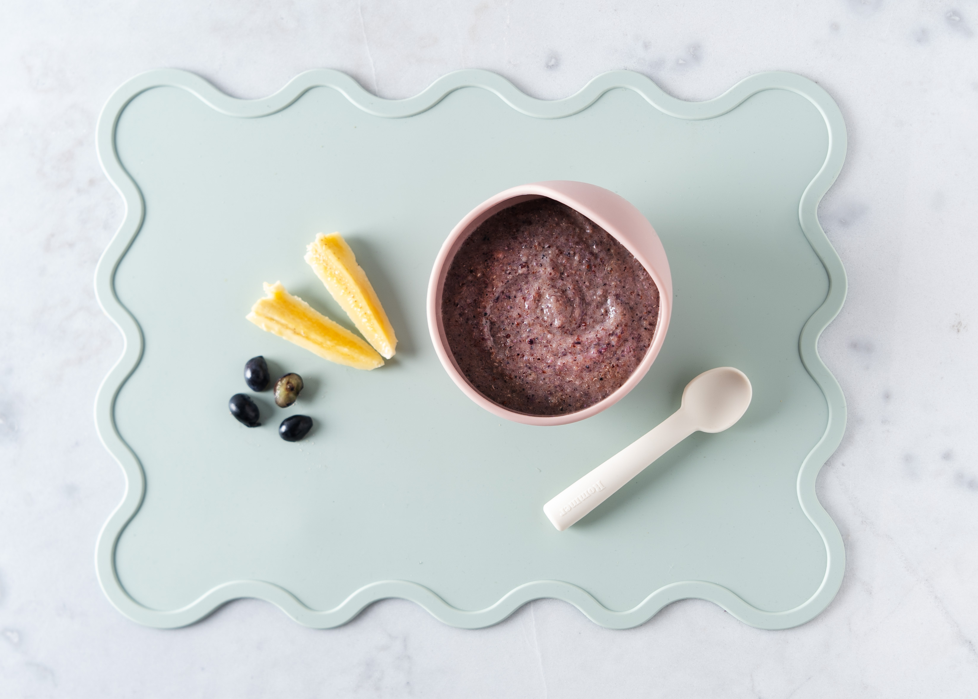 "Blueberry Banana Purée served in Le Puree Studio Best Feeding Essentials for Babies.