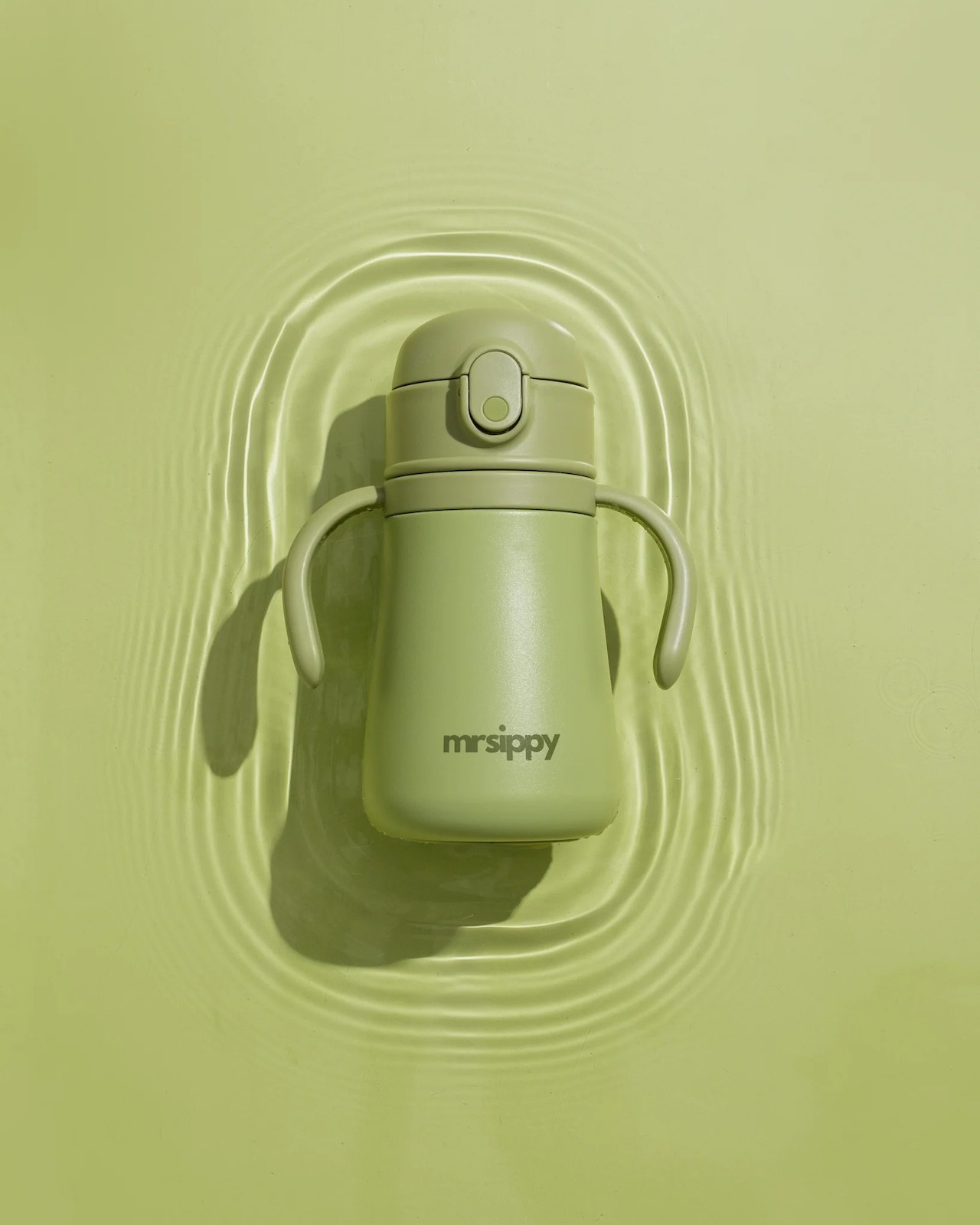 Mrsippy kids filtered water bottle shown in green against a green background