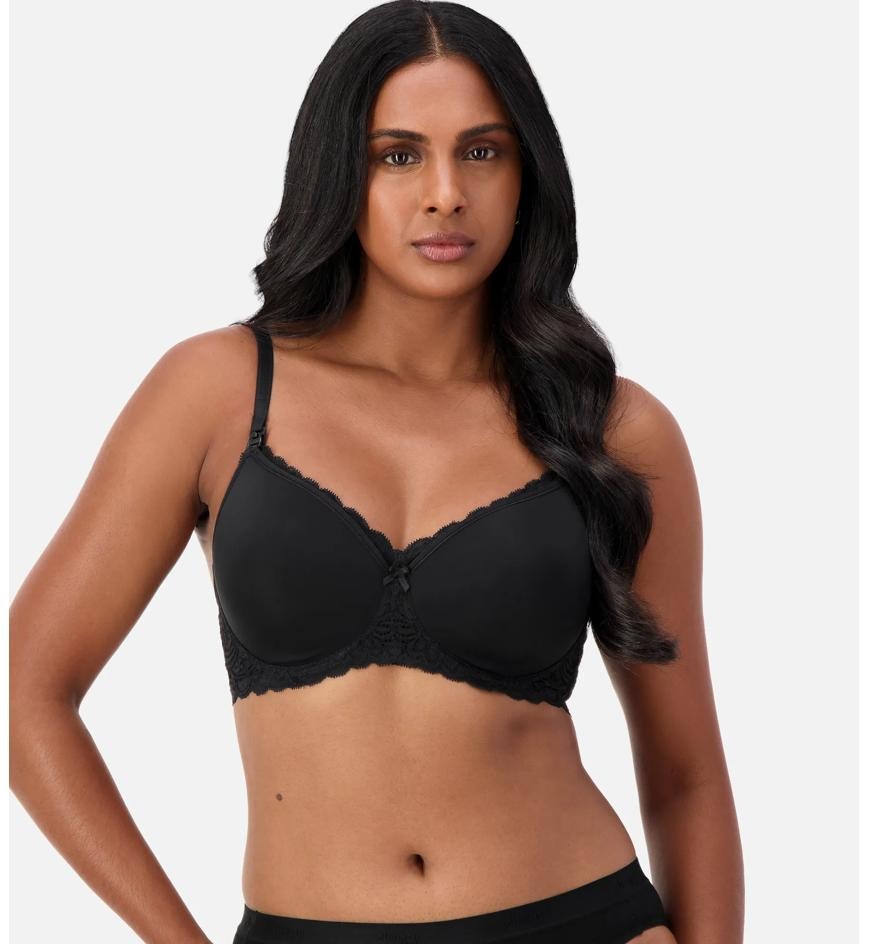 A woman wearing the triumph maternity bra in black