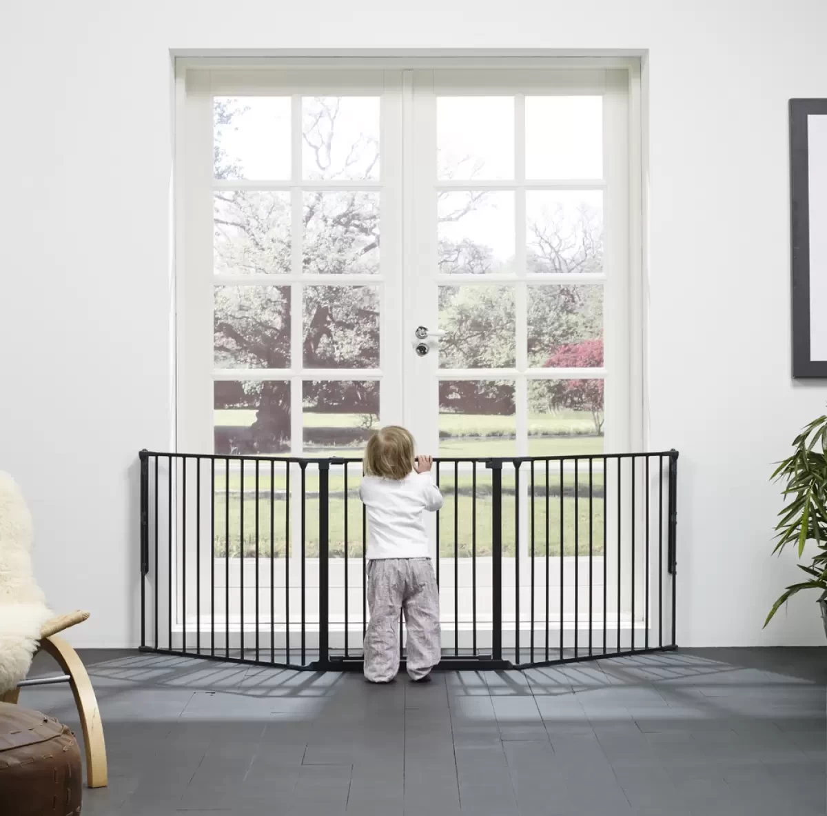 A black baby safety gate