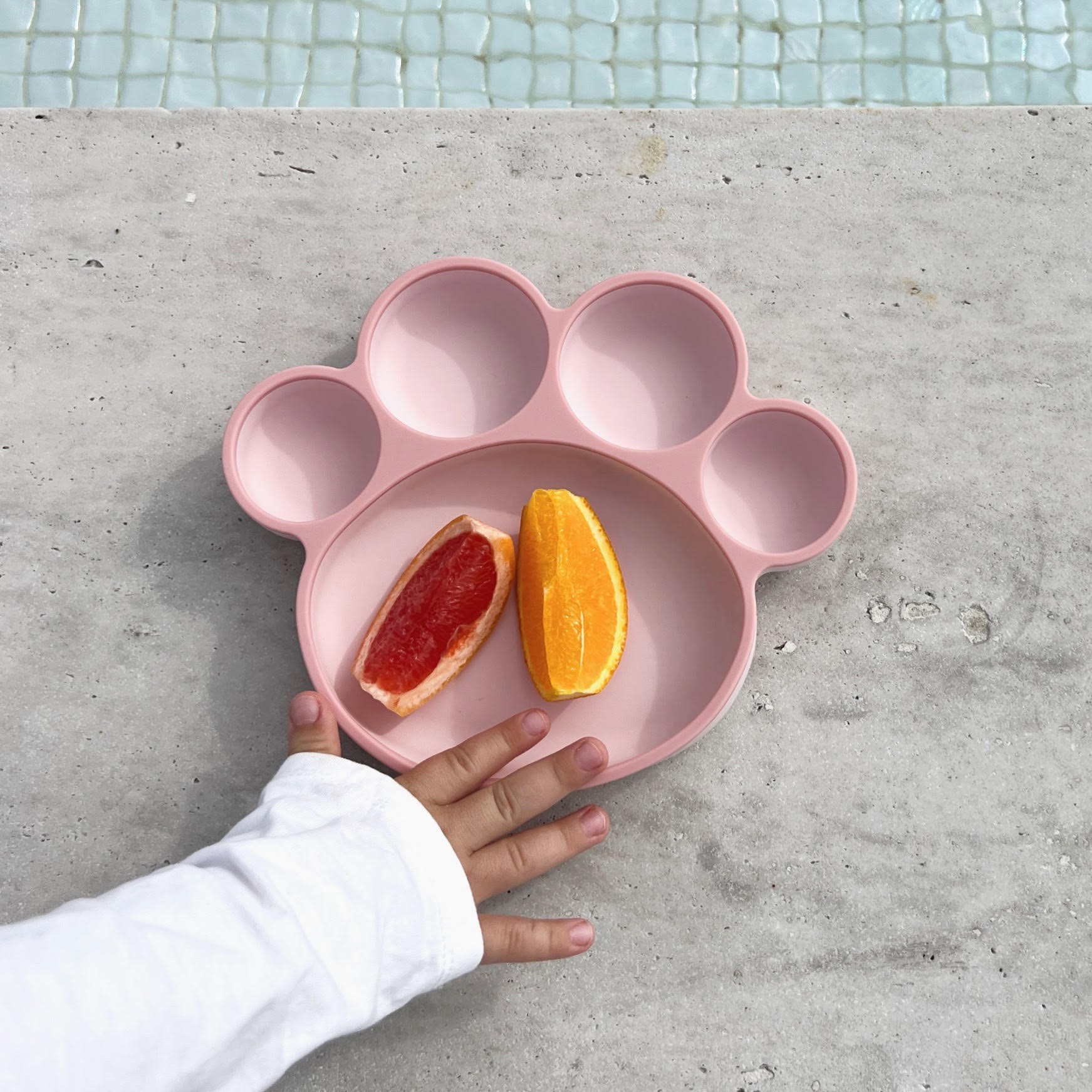 Healthy fruits on My Pure Silicone Suction Plate, the perfect Best Feeding Essential for your baby’s first meals.