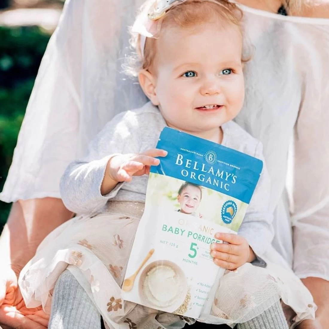 Close-up of a baby enjoying organic food from the best baby brand.
