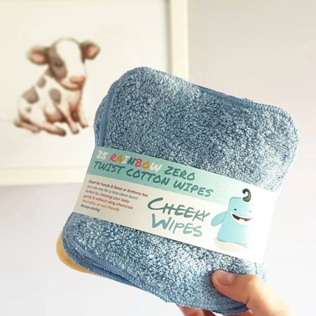 Hand holding soft and safe baby wipes from the best baby brand in Australia.