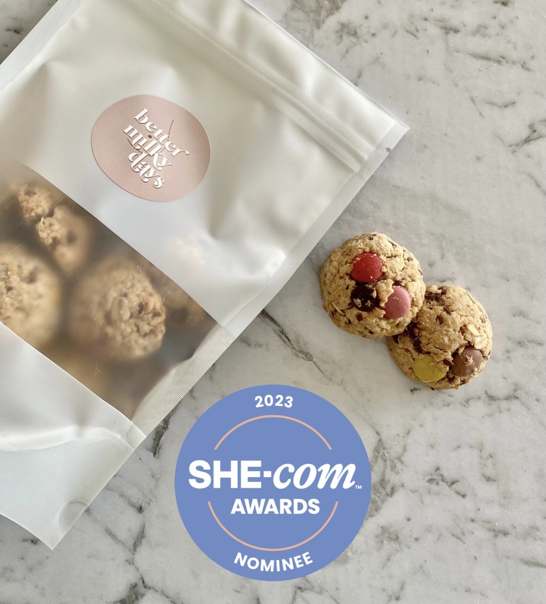 Better Milky Days best lactation cookies in white packaging on a marble table—elegant snack for breastfeeding mums.